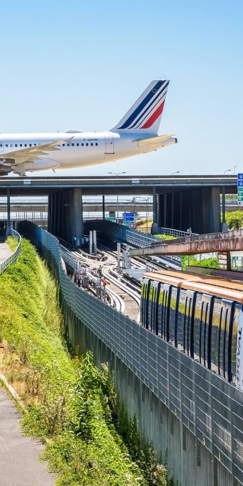 Toddler playing in a vibrant CDG Airport play area