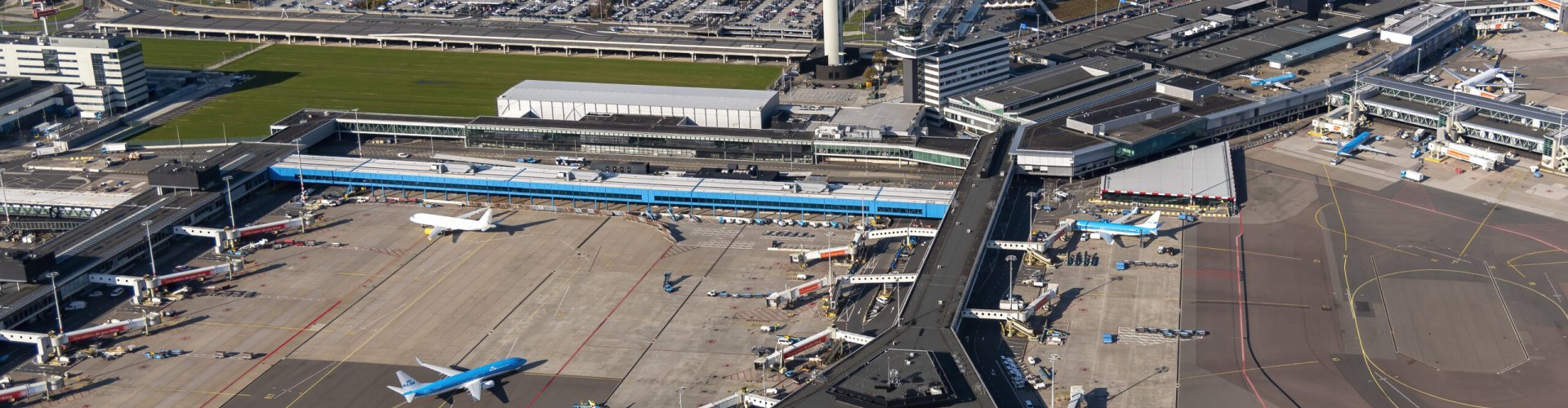 Sunset over Schiphol Airport terminal