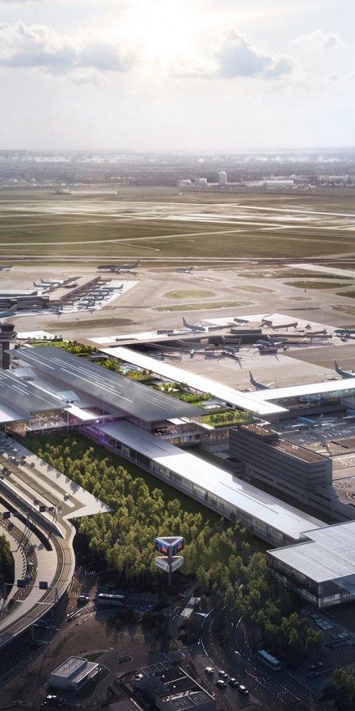 Mom enjoys quiet area with baby at Schiphol Airport