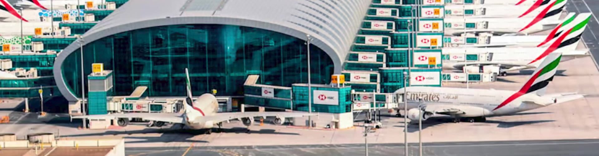 Sunset view over Dubai International Airport terminal