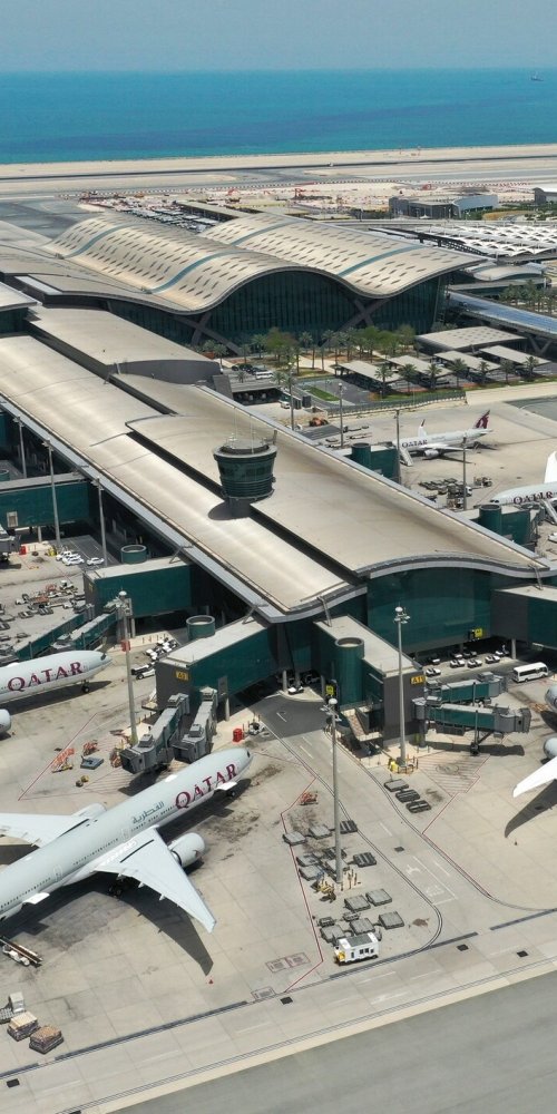 Mother and child resting in Doha Intl Airport quiet room