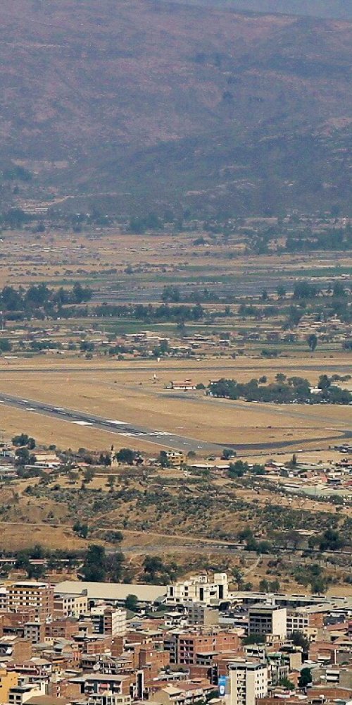 Family in relaxation zone at Jorge Wilstermann Intl Airport