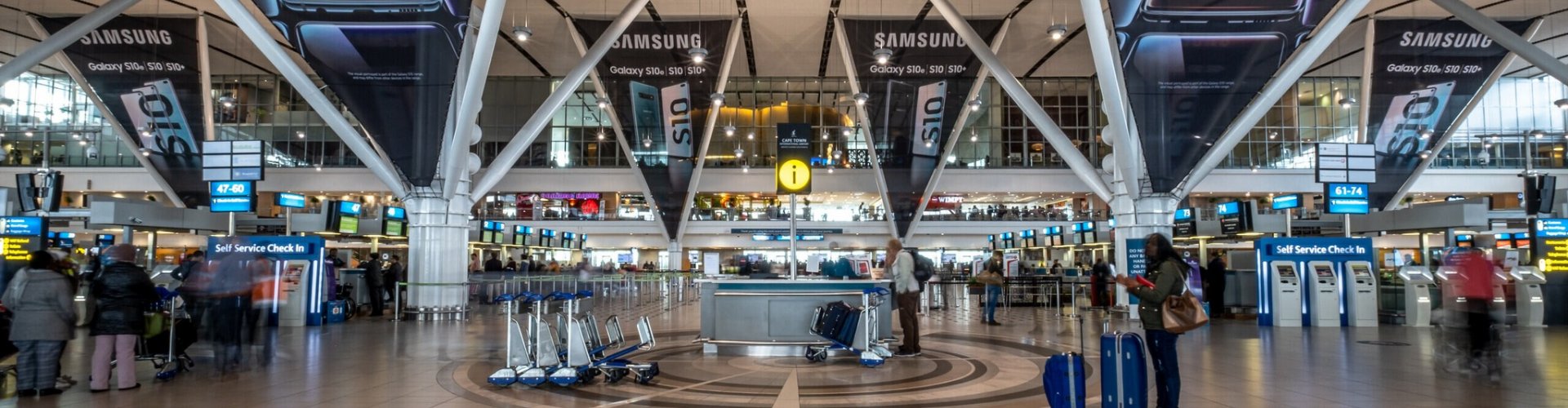Family enjoying play area at Cape Town Airport, ZA Airport